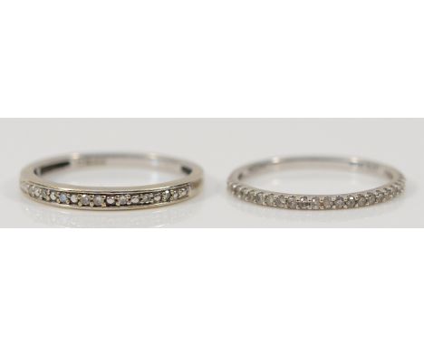 A 9ct white gold diamond half eternity ring, K 1/2, together with a 9ct white gold diamond half eternity ring, M, 2.3g