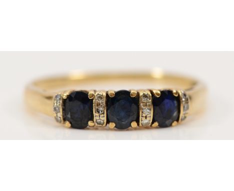 A 9ct gold sapphire and diamond dress ring, T, 2g