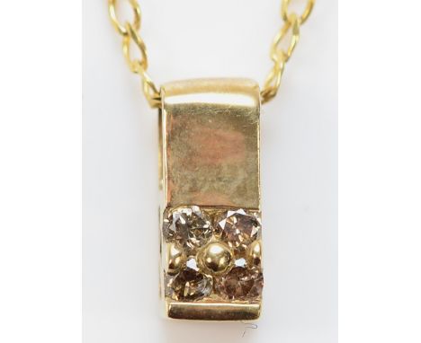 A 9ct gold diamond pendant on a chain, 2.2g