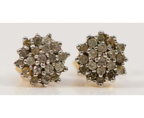 A pair of 9ct gold diamond cluster earrings with scroll backs, 1.3g