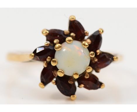 A 9ct gold garnet and opal floral cluster ring, K, 2.3g