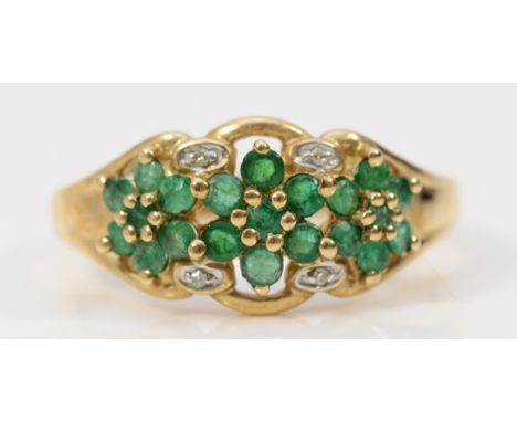 A 9ct gold emerald and diamond floral cluster ring, U, 3.8g