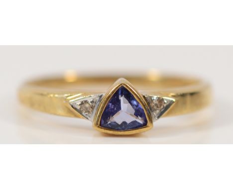 A 9ct gold tanzanite solitaire ring with diamond set shoulders, N, 1.5g