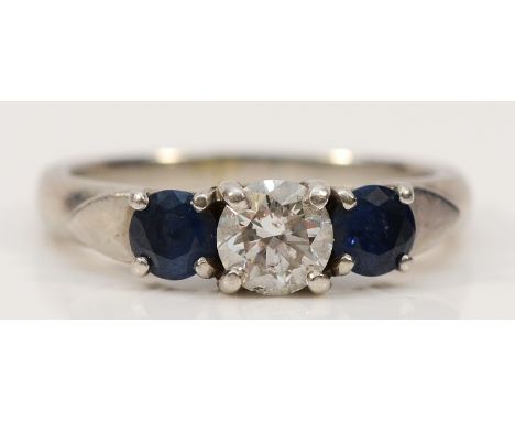 A 950 platinum sapphire and brilliant cut diamond three stone ring, estimated GH, VS2, approx 0.40ct, ring has been resized, 