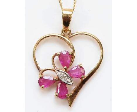 A 9ct gold ruby and diamond butterfly and heart shaped pendant on a chain, 20mm, 1.9g