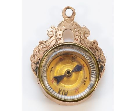 A Victorian 9ct gold charm in the form of a compass, with engraved to the top and rear, Birmingham 1886, 22mm, 4.5g