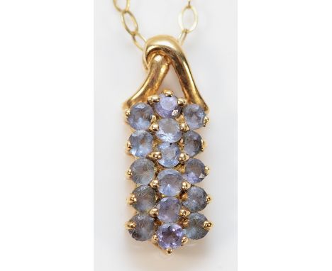 A 9ct gold tanzanite pendant on a chain, 20mm, 3g