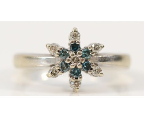 A 9ct white gold blue and white diamond cluster ring, L, 2.9g