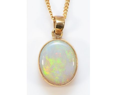 A 9ct gold opal pendant on a chain, 12mm x 9mm opal, 3.3g
