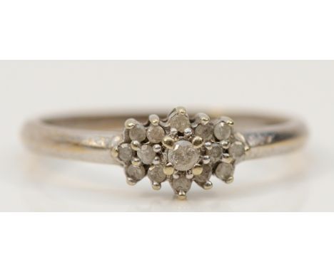 A 9ct white gold diamond cluster ring, stated 0.15ct, N, 1.5g