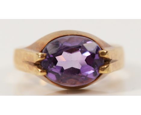 A 9ct gold amethyst solitaire ring, Birmingham 1978, 10mm x 7mm amethyst, 3.4g