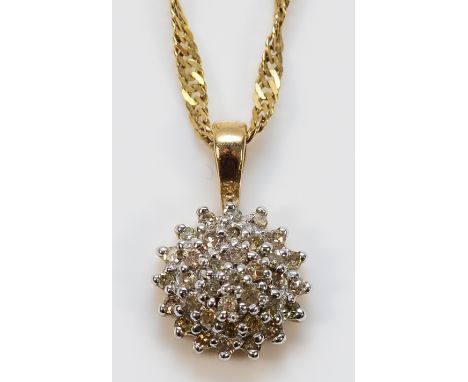 A 9ct gold diamond cluster pendant on a chain, 2.8g