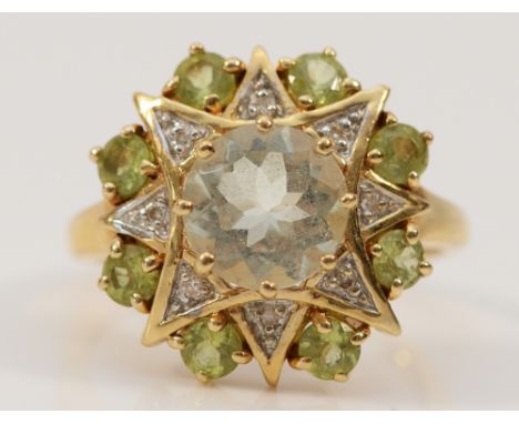 A 14K gold blue topaz, peridot and diamond cluster ring, 8mm topaz, 17mm ring front, N 1/2, 4.2g