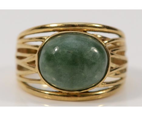 A 9ct gold jade cabochon dress ring, L 1/2, 4.7g