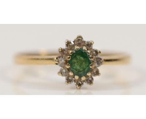 A 9ct gold emerald and diamond cluster ring, O, 1.7g