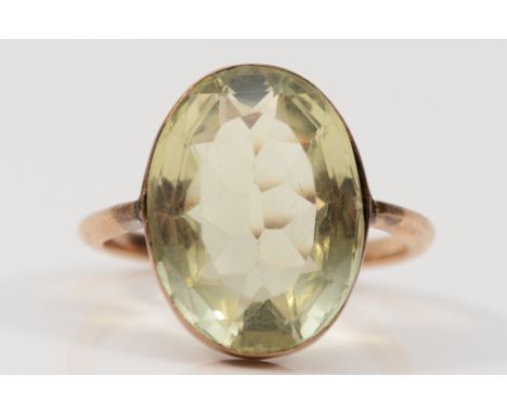 An unmarked 9ct gold citrine dress ring, bezel set, 17mm x 14mm x 7mm citrine, I, 4.4g