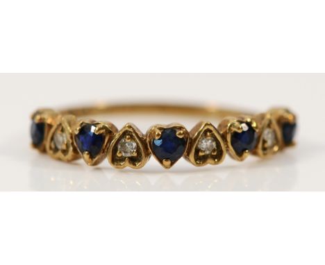 A 9ct gold sapphire and diamond heart shaped half eternity ring, London 1981, N 1/2, 1.2g