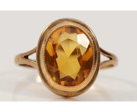 A 9ct gold citrine dress ring, hallmarks worn, 11mm x 9mm citrine, M, 3.2g