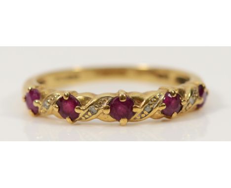 A 9ct gold ruby and diamond dress ring, P, 1.9g