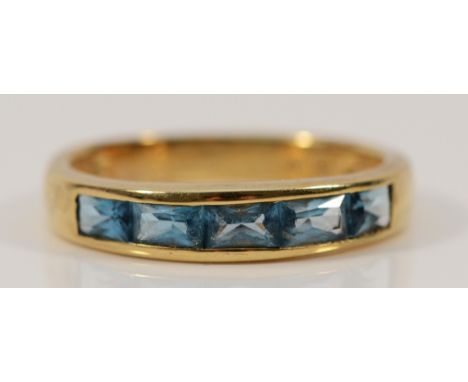 A 9ct gold blue gemstone channel set half eternity ring, N, 2.3g