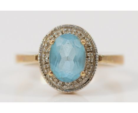 A 9ct gold diamond and topaz dress ring, 8mm x 6mm topaz, Birmingham 2004, L, 2.4g