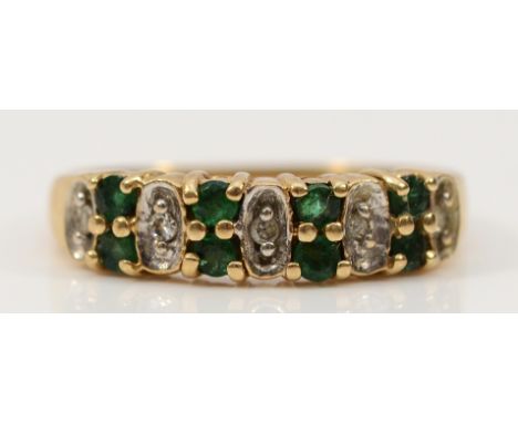 A 9ct gold emerald and diamond dress ring, L, 2.1g