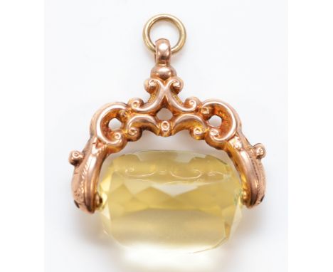 A 9ct gold citrine spinner fob, 18mm citrine, 6g