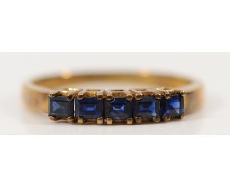 A 9ct gold sapphire five stone half eternity ring, M, 1.8g