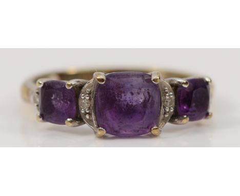 A 9ct gold amethyst and diamond dress ring, hallmarks removed possibly due to resizing, J, 1.8g