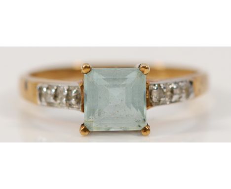An unmarked 9ct gold blue topaz and diamond ring, 6mm x 6mm topaz, O 1/2, 1.7g