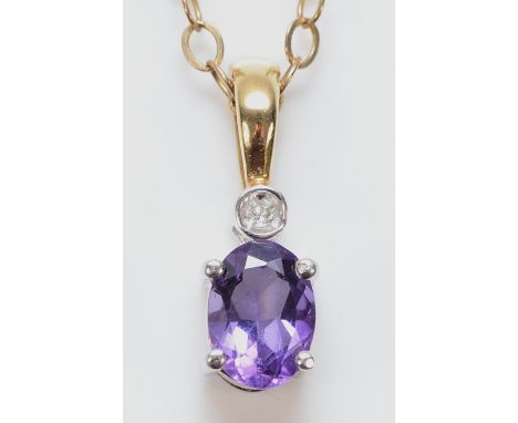 A 9ct white and yellow gold amethyst and diamond pendant on a chain, 15mm, 2.4g