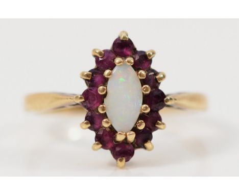 A 9ct gold ruby and opal cluster ring, O, 2.9g
