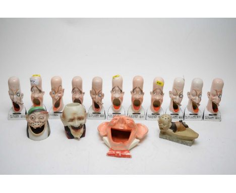 Eleven Continental novelty porcelain inkwells, each in the form of a caricature figure singing, the bases inscribed with a so
