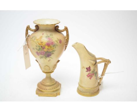 A Royal Worcester blush ivory hand-painted two-handled vase; and a jug. (2)