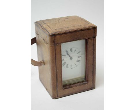 A French gilt brass cased carriage timepiece, with white enamel dial, roman numerals, housing a single-train drum movement, i