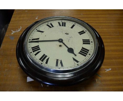 A 20th Century wall clock, the 11 1/2in. white enamel dial with roman hours, contained within a white metal bezel and stained