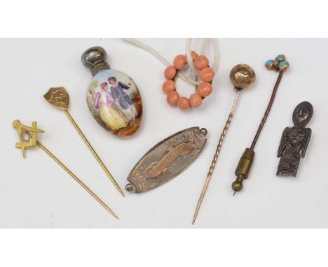 A selection of gentleman's late 19th/early 20th Century tie pins, including one Masonic, and another set turquoise and small 