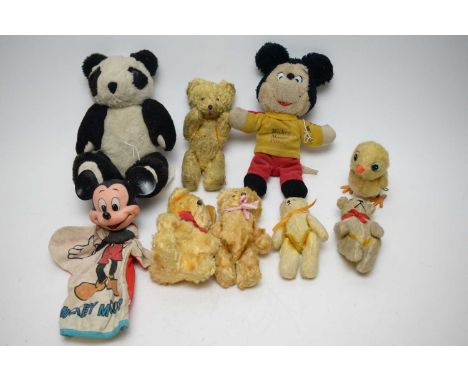 A Mickey Mouse glove puppet with plastic head; a Mickey Mouse Power Doll; four teddy bears; a panda; and a clockwork chick.