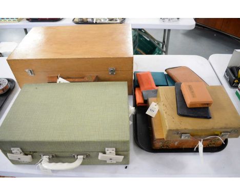 A large collection of flies and reservoir lures in one wooden box and several plastic cases; together with a large quantity o