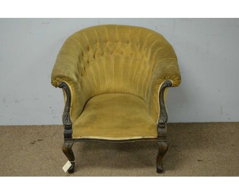 A Victorian tub chair, with deep button back and padded seat, raised on squat cabriole legs, 75 x 76 x 67cms.