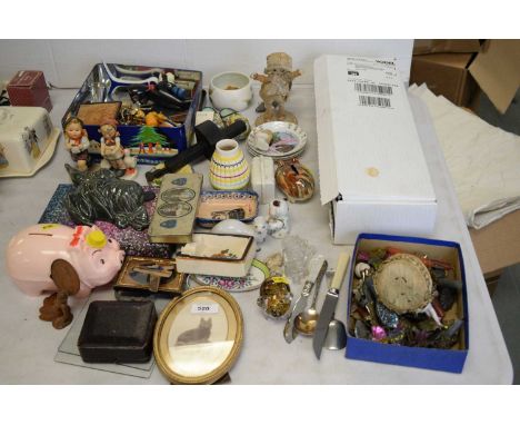 A miscellaneous group of items, including: two Hummel figures, one titled 'Be Patient'; a photograph frame; a selection of pa