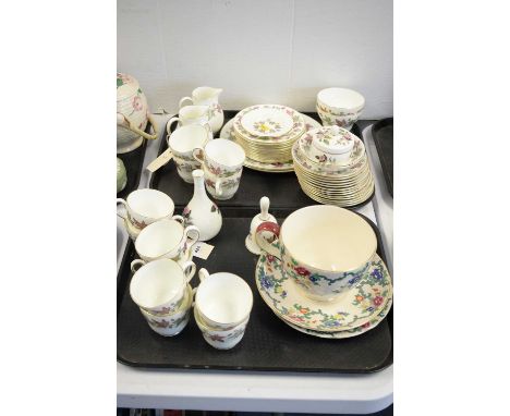 A Wedgwood 'Ivy House' pattern part service, comprising: teacups, saucers, plates, bread and butter plate, sugar bowl, two mi