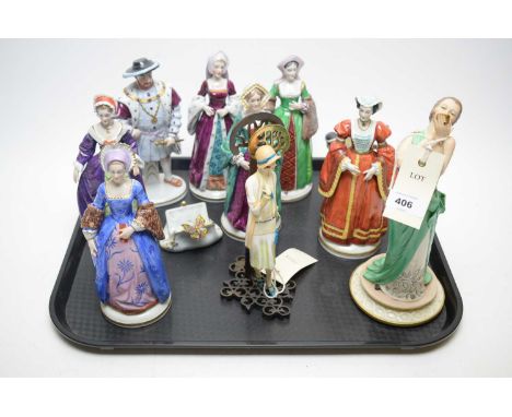 Sitzendorf porcelain figurines of Royalty; a Capodimonte figurine 'Mod Liberty'; and other items, on a tray.