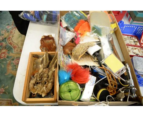 Fly tying vice and fly tying tools; Fisherman's Priest; and a large quantity of fly tying materials, etc. in a box.