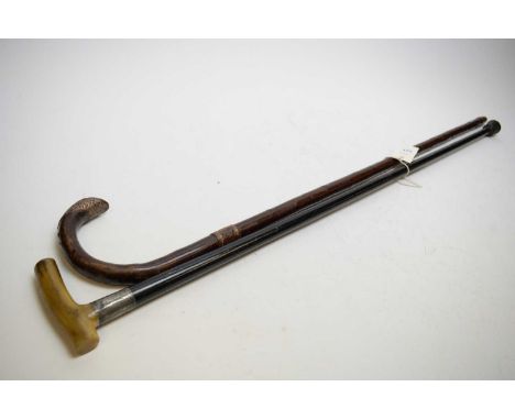 A horn-handled walking stick, with silver-plated ferrule and ebonised cane; another with plated mounts, inscription.