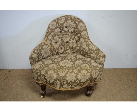 A Victorian corner chair, upholstered in brown and grey fabric, the arched and deep buttoned back and arms above a padded sea