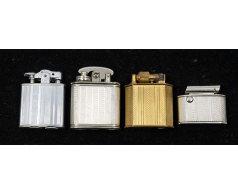A collection of four Art Deco style lighters to include; a 935 engine turned silver hexagonal shaped small lighter, approx. 3