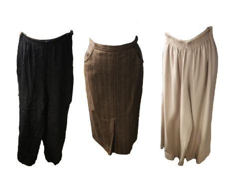A Margaret Howell 1980s size 12 mid brown skirt, 2 side pockets, kick pleats at back, fully lined.&nbsp; A pair of beige elas