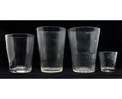 A collection of ale glasses, fluted and plain along with a small twisted gin glass, all late 18th Century.