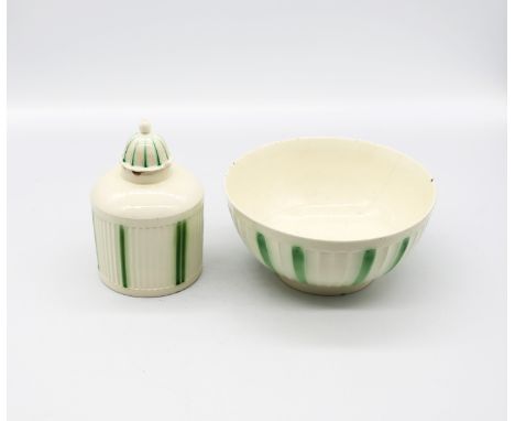 A Leeds creamware tea caddy and cover along with a Leeds creamware bowl. Both with ribbed bodies and green stripes. (2) Circa